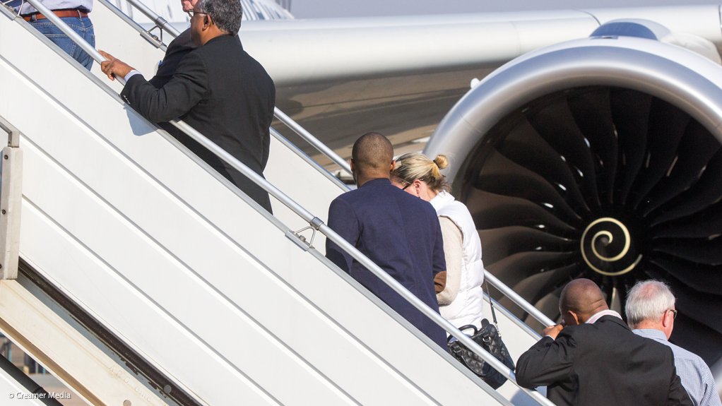 People boarding a plane