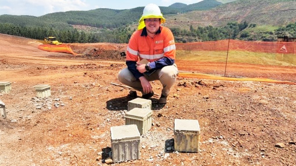 Engineering inspection of concrete test cubes.