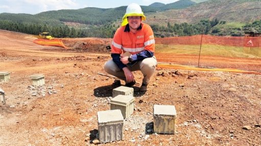 Engineering inspection of concrete test cubes.