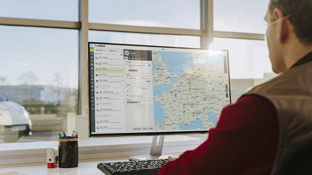 Image of a person in front of a computer screen viewing a route map