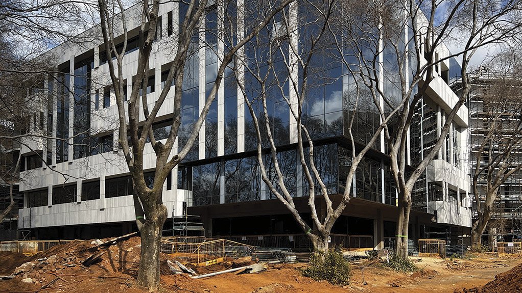 The varied façade finishes on each elevation on the Compensation Fund House include unitised panels and precast ventilated cladding, which added complexity to both demolition and construction detailing