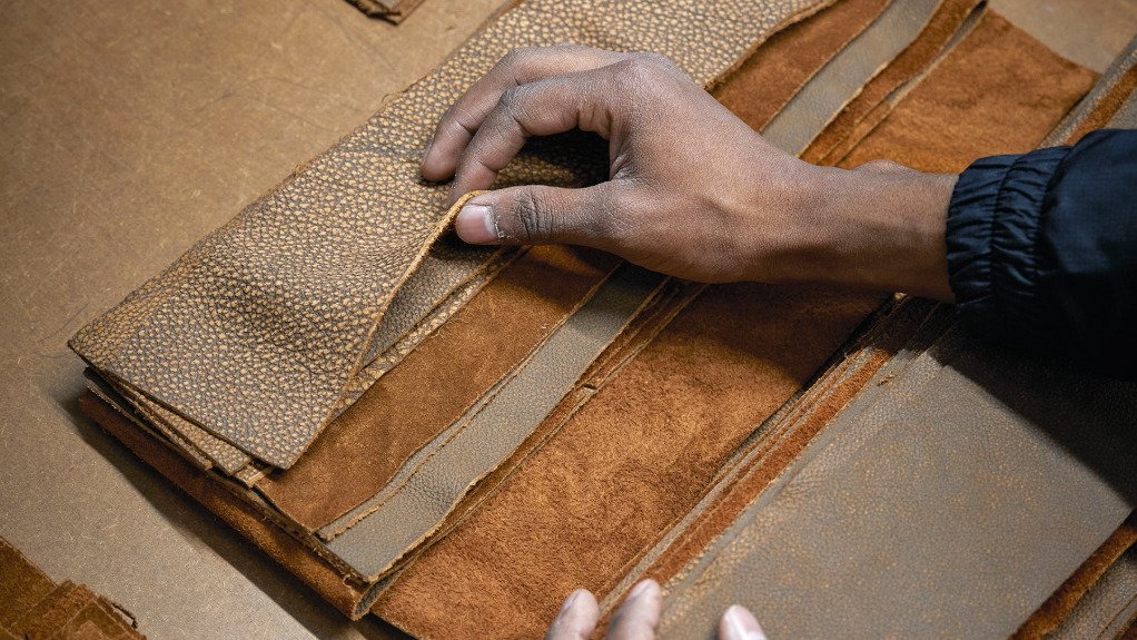 Worker sewing upholstery