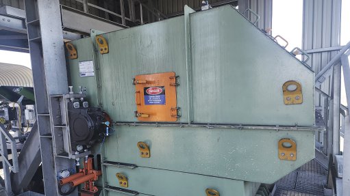 A Weba Chute Systems conveyor transfer chute in operation at a Mpumalanga mine, efficiently transferring thermal coal with minimal spillage and wear