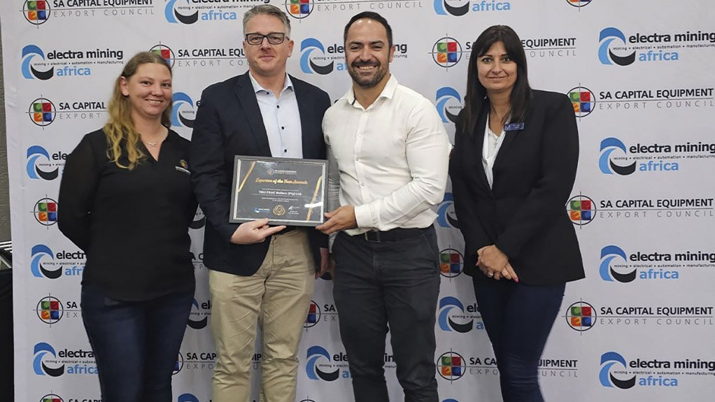 From left, Philipp Starrach, International Sales Manager at Tru-Trac, and David Pereira, Head of Sales at Tru-Trac, proudly accept the Exporter of the Year award on behalf of the entire Tru-Trac team
