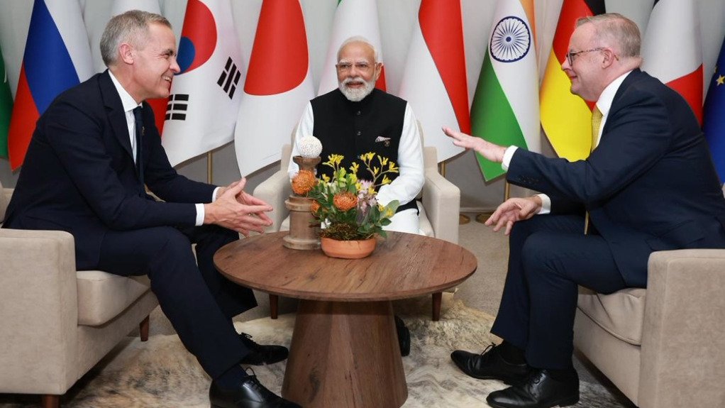 Prime Ministers Mark Carney, Narendra Modi and Anthony Albanese meeting at the G20 Leaders Summit in Johannesburg, South Africa.