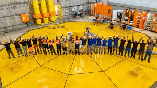 Employees celebrating completion of Turbine 5 at Inga II