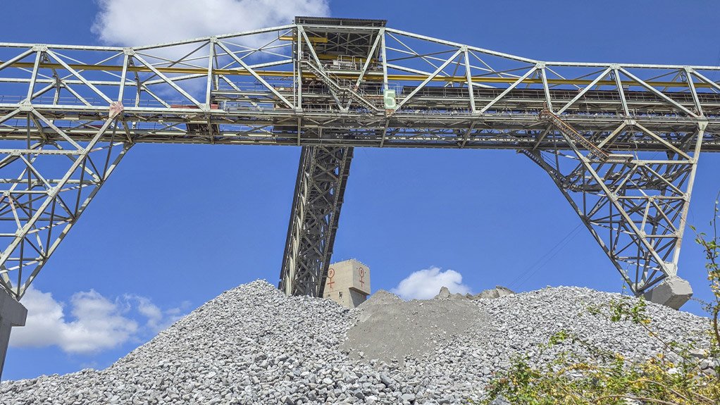 A conveyor-on-conveyor transfer chute installed by Weba Chute Systems at Palabora Copper Mine (PMC) which is still operating efficiently more than 20 years after installation