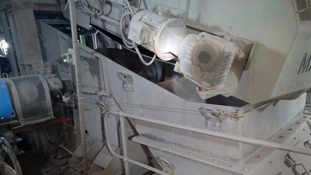 Custom engineered by Weba Chute Systems, this sacrificial conveyor-on-conveyor chute installed at PMC handles coarse copper ore in demanding underground conditions