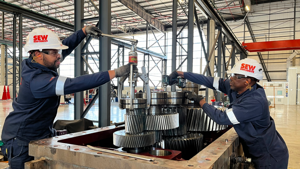 An image of SEW-EURODRIVE staff working on repairs at one of its manufacturing facilities