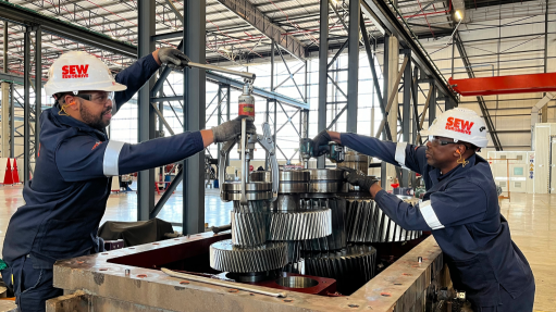 An image of SEW-EURODRIVE staff working on repairs at one of its manufacturing facilities 