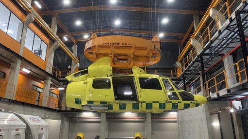 Image of helicopter fuselage suspended from a Condra crane