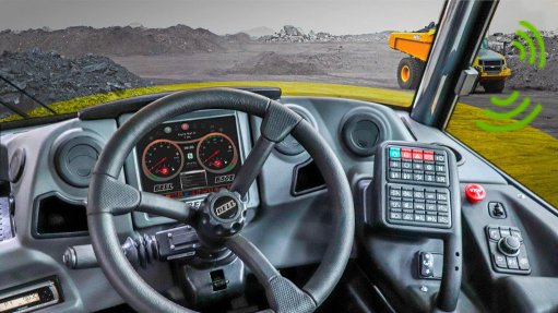 Image of a steering wheel and dashboard