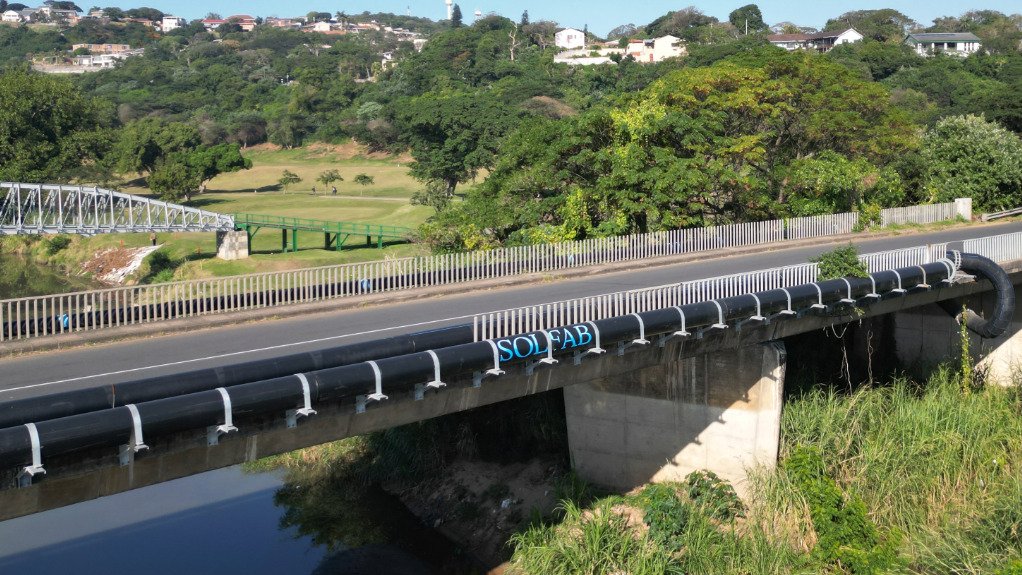 An image of an HDPE pipeline on a bridge