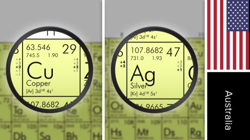 Image of US flag and periodic table symbols for gold and copper