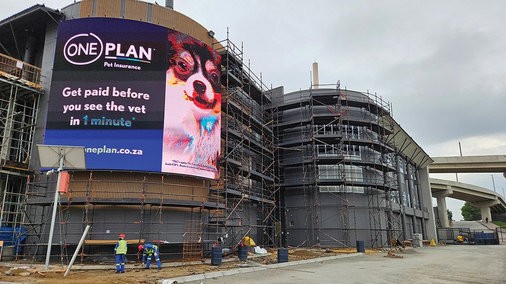 Timber cladding installation underway as part of the façade refurbishment at Concor’s The View project at Fourways Mall.