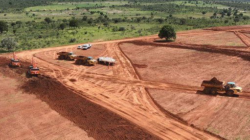 Image of earth-moving equipment at the tailings storage facility at the Longonjo project