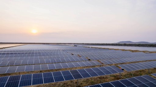 An SPS Solar array reaching to the horizon at dusk.