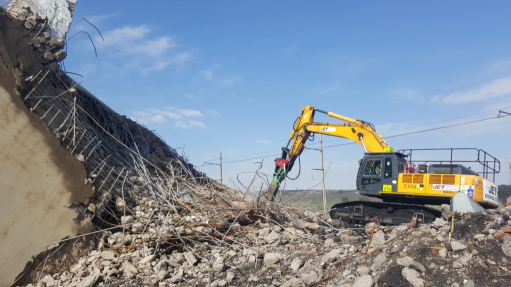 An image of rubble being removed for recycling