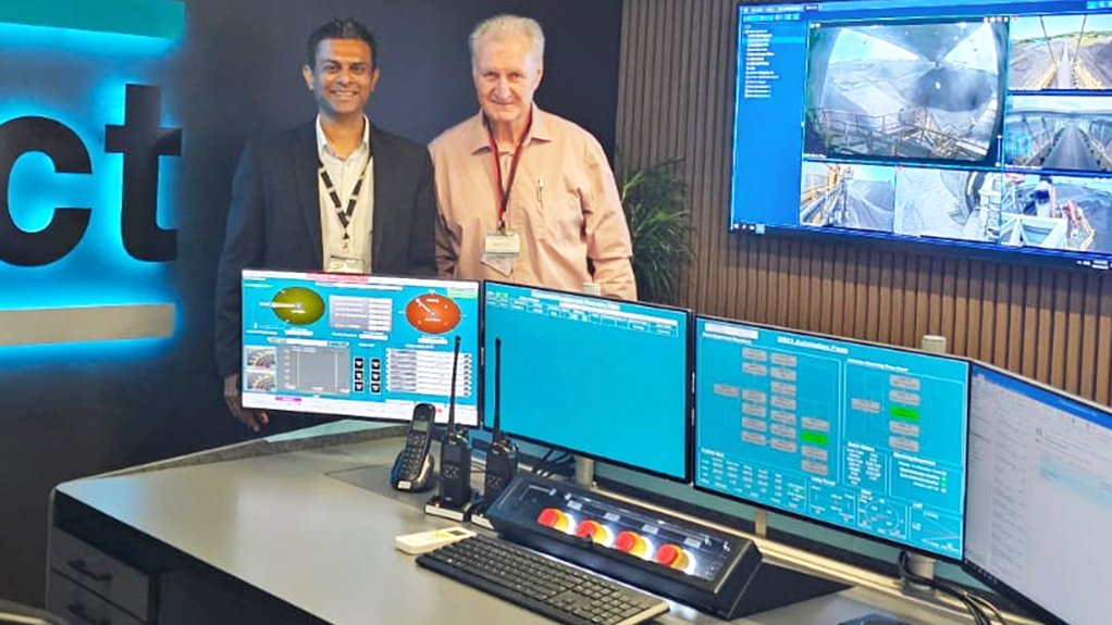 Mining Weekly's Martin Creamer (right) with RBCT GM Asset Management Kubendren Naidoo in automation control room.
