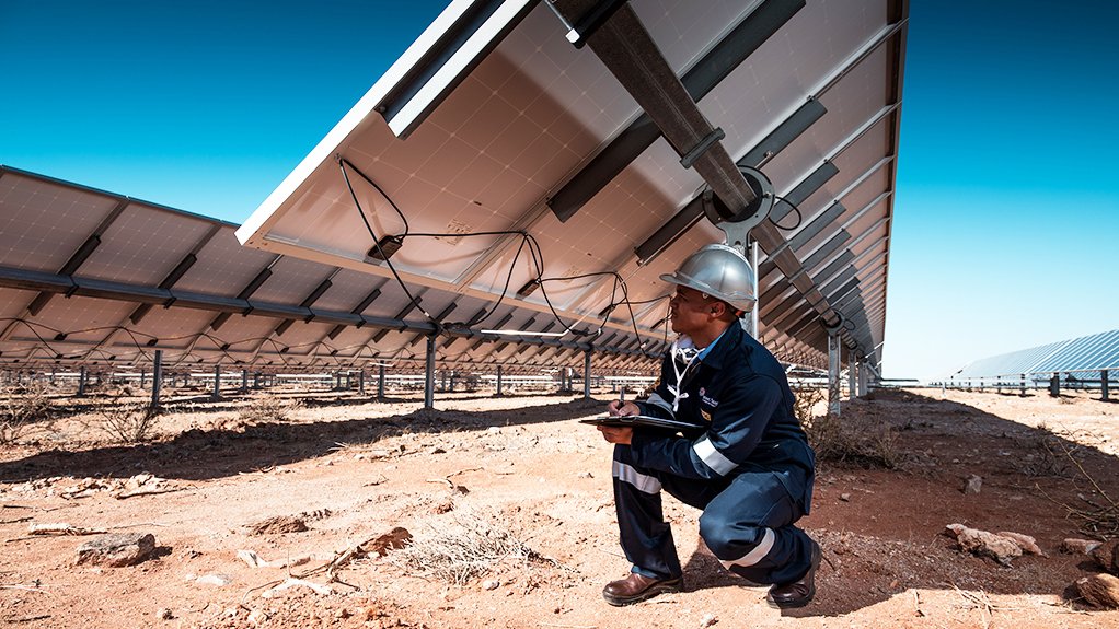 Scatec worker on solar farm