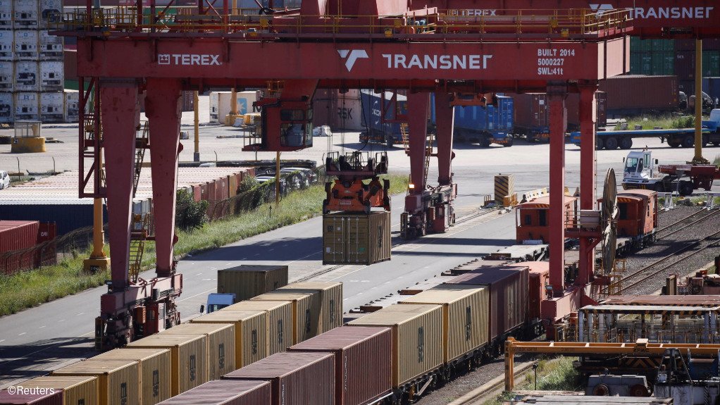Containers are moved from rail cars at the Container Terminal at the port in Durban, South Africa
