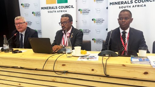 Minerals Council president Paul Dunne, CEO Mzila Mthenjane and acting chief economist Bongani Motsa at Mining Indaba.