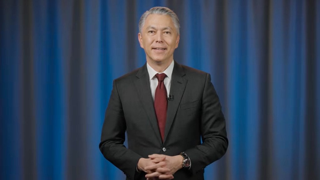 CEO Mike Henry delivering BHP's half-year results.