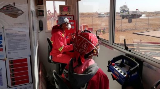 The above image depicts two operators working from inside an air-conditioned command cabin
