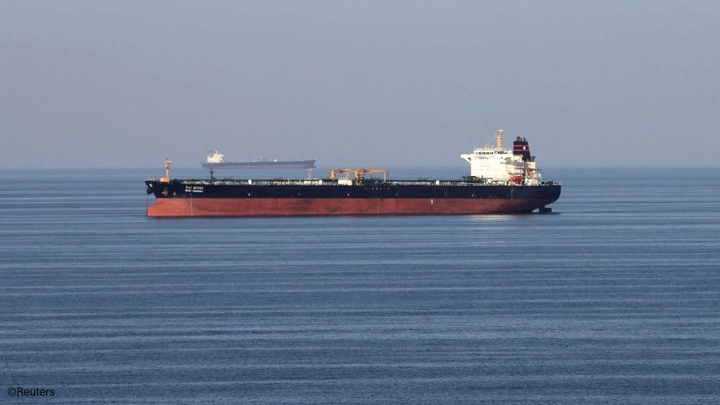 Oil tankers pass through the Strait of Hormuz