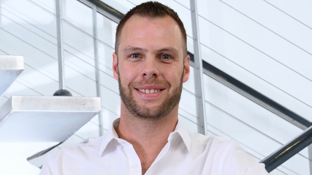 Weir original equipment GM Marnus Koorts, white shirt, smiling