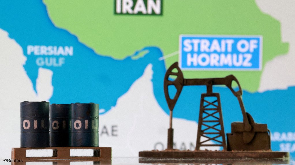 An illustration with 3D-printed oil barrels, an oil pump jack and a map showing the Strait of Hormuz and Iran