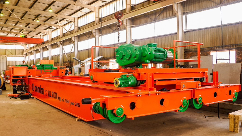 An image of a crane being worked on by Condra