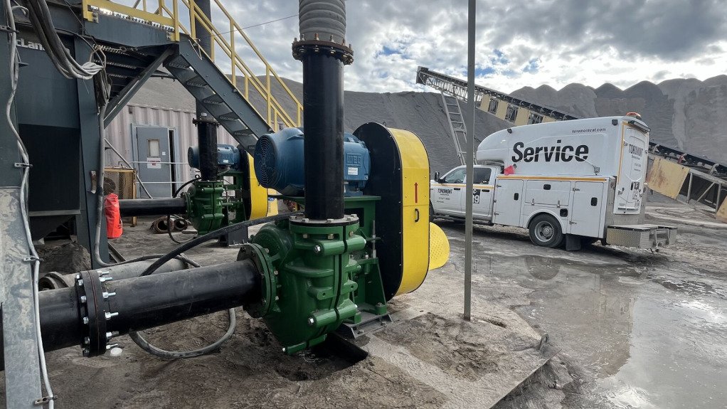 A newly installed green pump manufactured by Schurco Slurry
