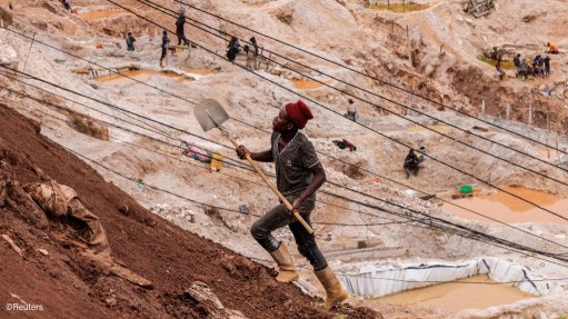 Miners at the Rubaya mine in the DRC