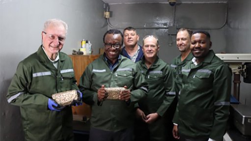 At gold pour are (from left) Martin Creamer, Lucas Msimango, Jaques De Beer, Michael Quinert, Rudi Deysel and Ayanda Shabalala.