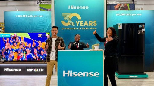 Image of hisense staff at their stall at the exhibition