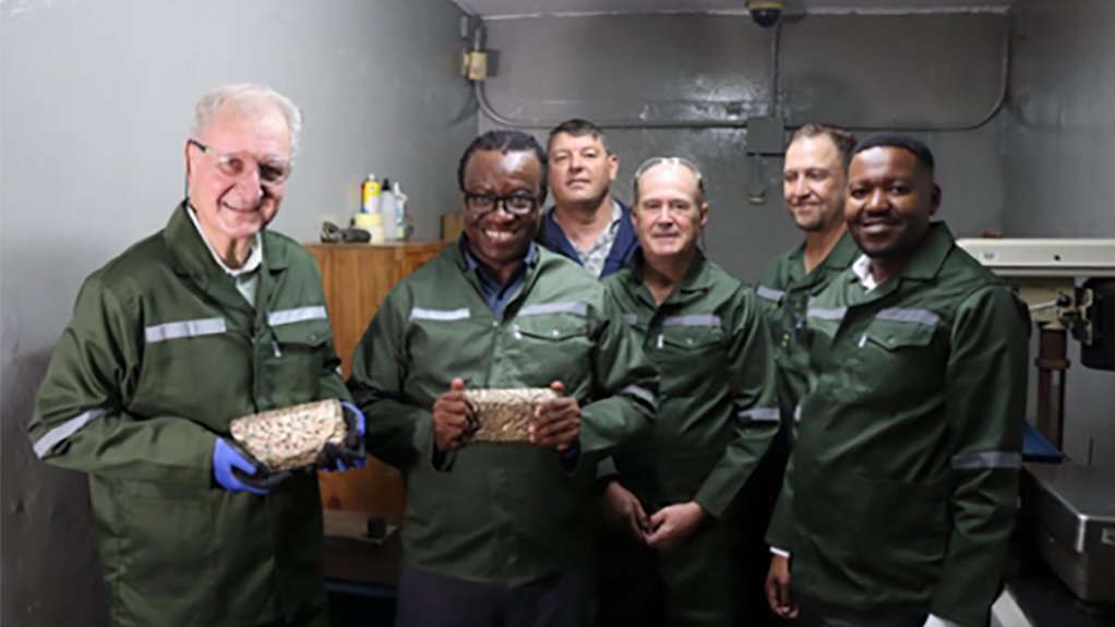 At gold pour are (from left) Martin Creamer, Lucas Msimango, Jaques De Beer, Michael Quinert, Rudi Deysel and Ayanda Shabalala.