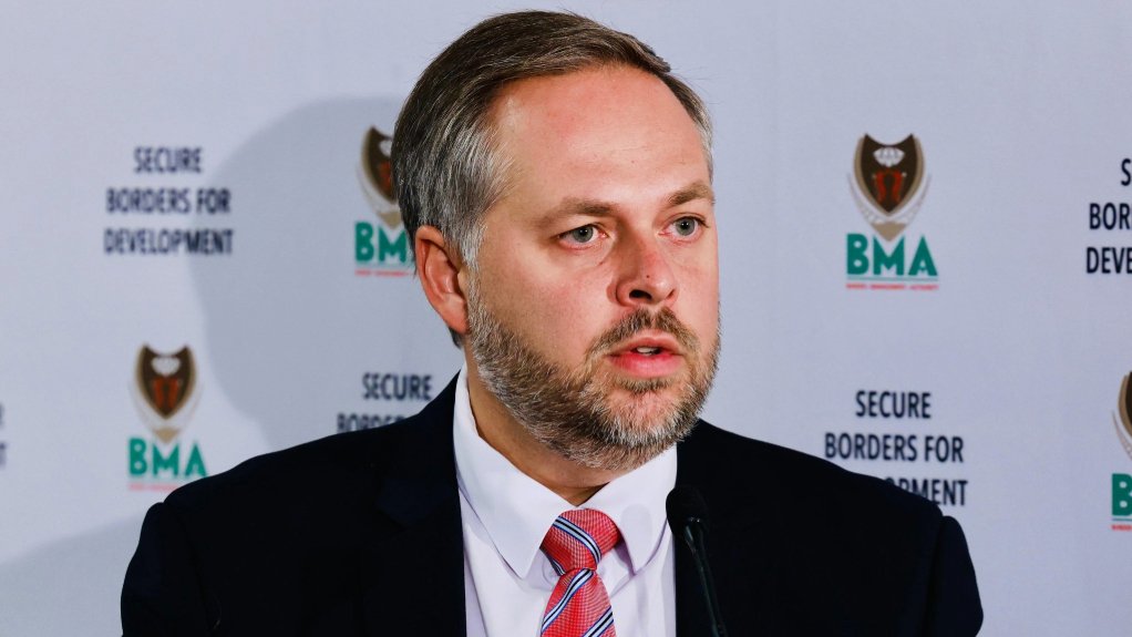 Home Affairs Minister Dr Leon Schreiber