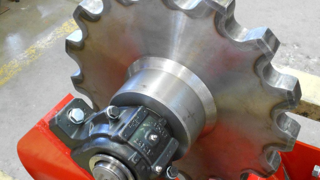 An image of a large sprocket tensioner