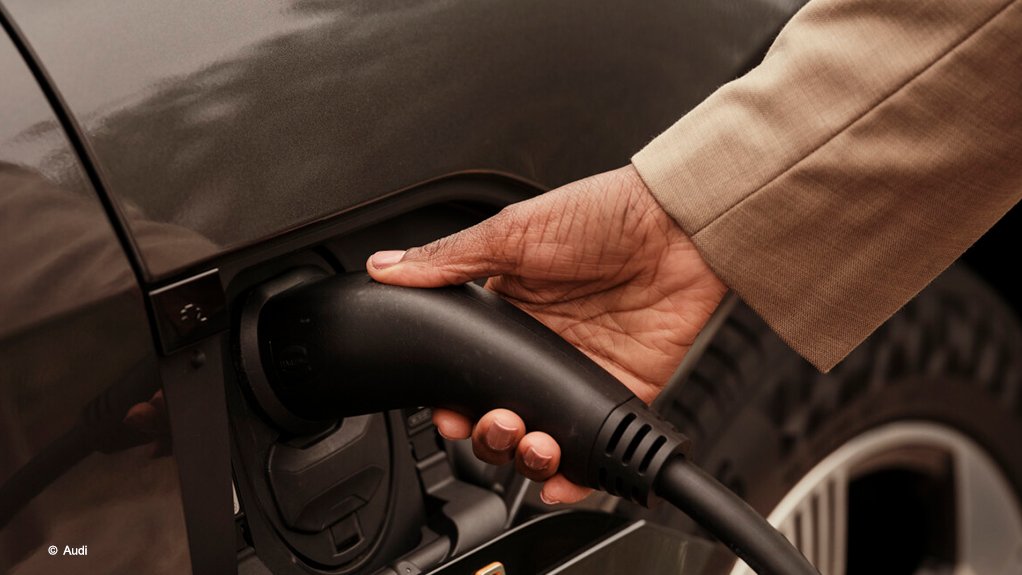 An image of an Audi charging 