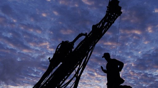 Silhouette of an exploration drill rig
