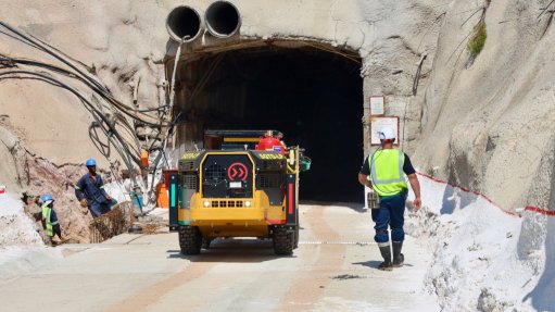 A man in PPE moving into the newly developed mine at West Wits Qala Shallows 