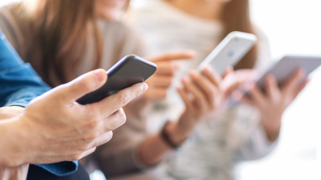 People using cellphones and mobile devices