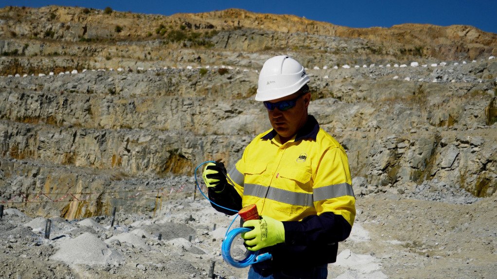 An image of a mine operators using the AXXIS Titanium system 