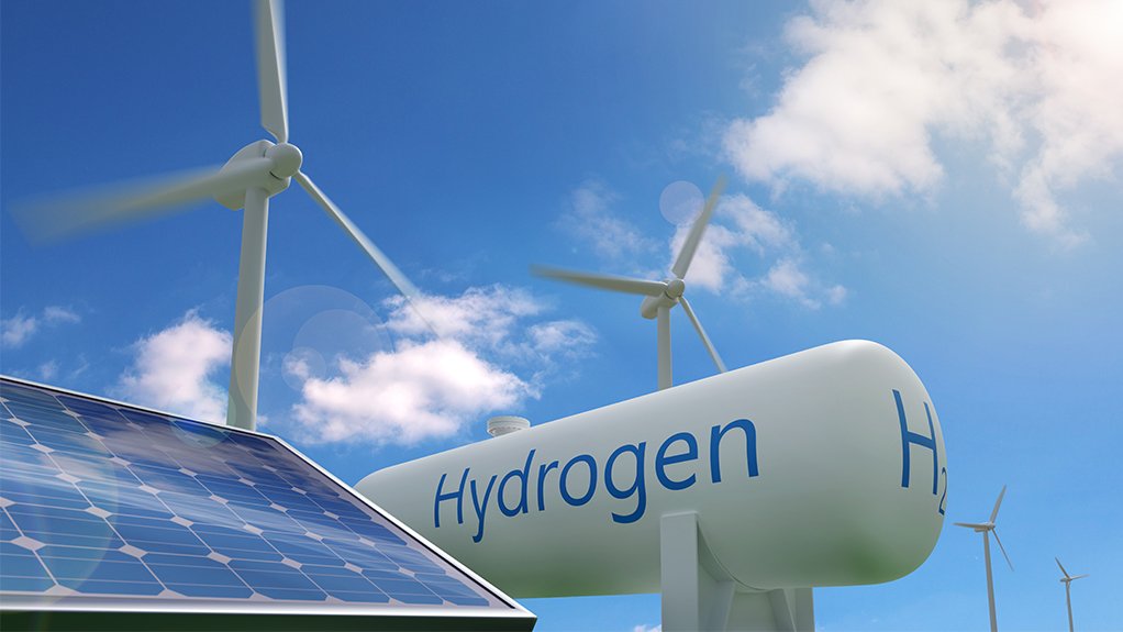 A hydrogen storage tank, wind turbines and solar PV panels