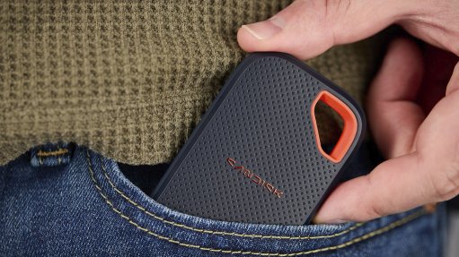 Image of a Sandisk portable solid-state drive in pocket