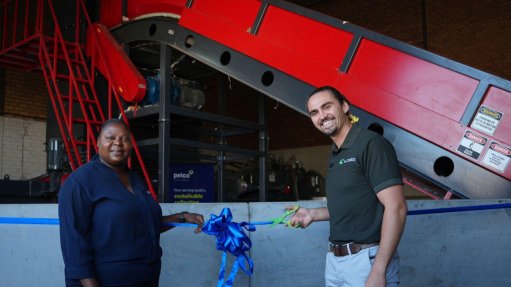 Unveiling the new recycling baling machine and conveyor system are (from left) Petco Producer Responsibility Organisation CEO Telly Chauke and CL Trading MD Shaun Styger