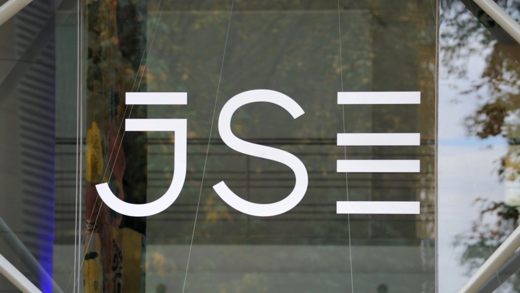 An image of the JSE logo on the company building window