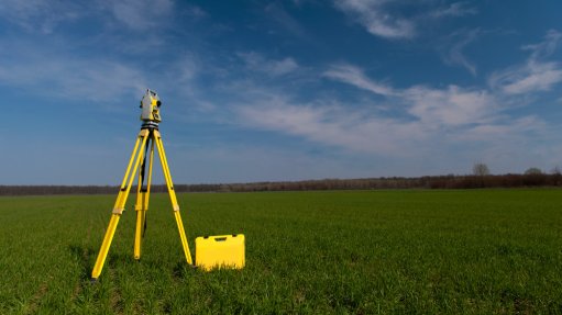 a geospatial measuring tool in a large green field