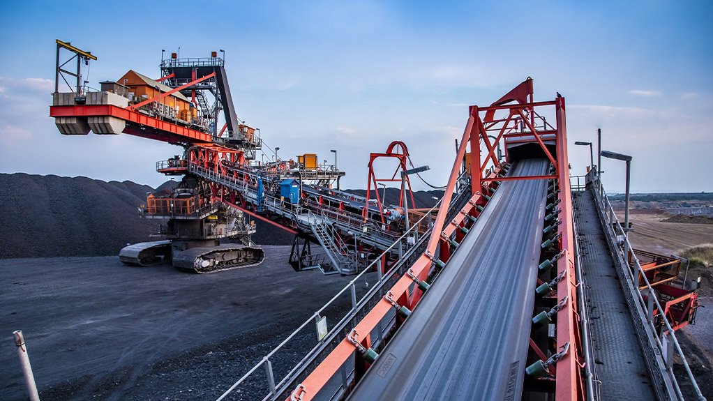 Ore is conveyed into a custom designed Weba Chute Systems transfer chute that delivers centralised loading and controlled flow to enhance conveyor health and performance